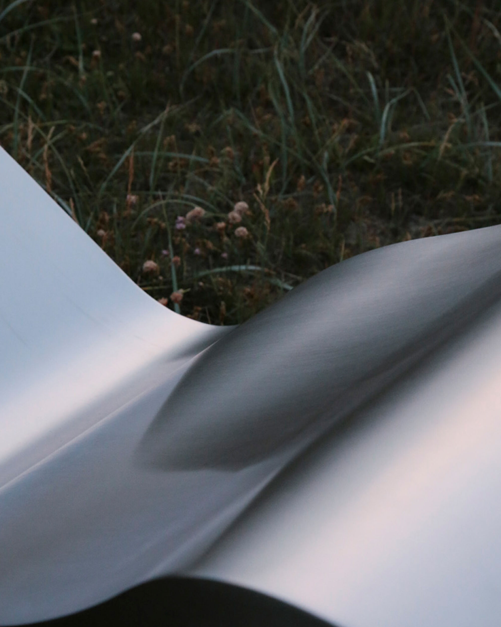 Muuto curved aluminum detail outdoor